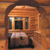 arched passage in log wall
